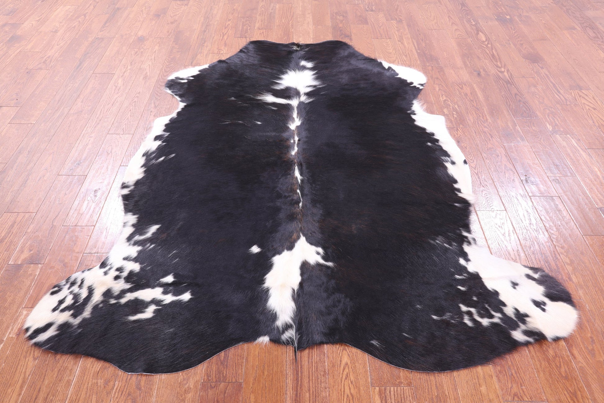 Black & White Natural Hair-On Cowhide Rug - 6' 11" X 6' 0" - Golden Nile