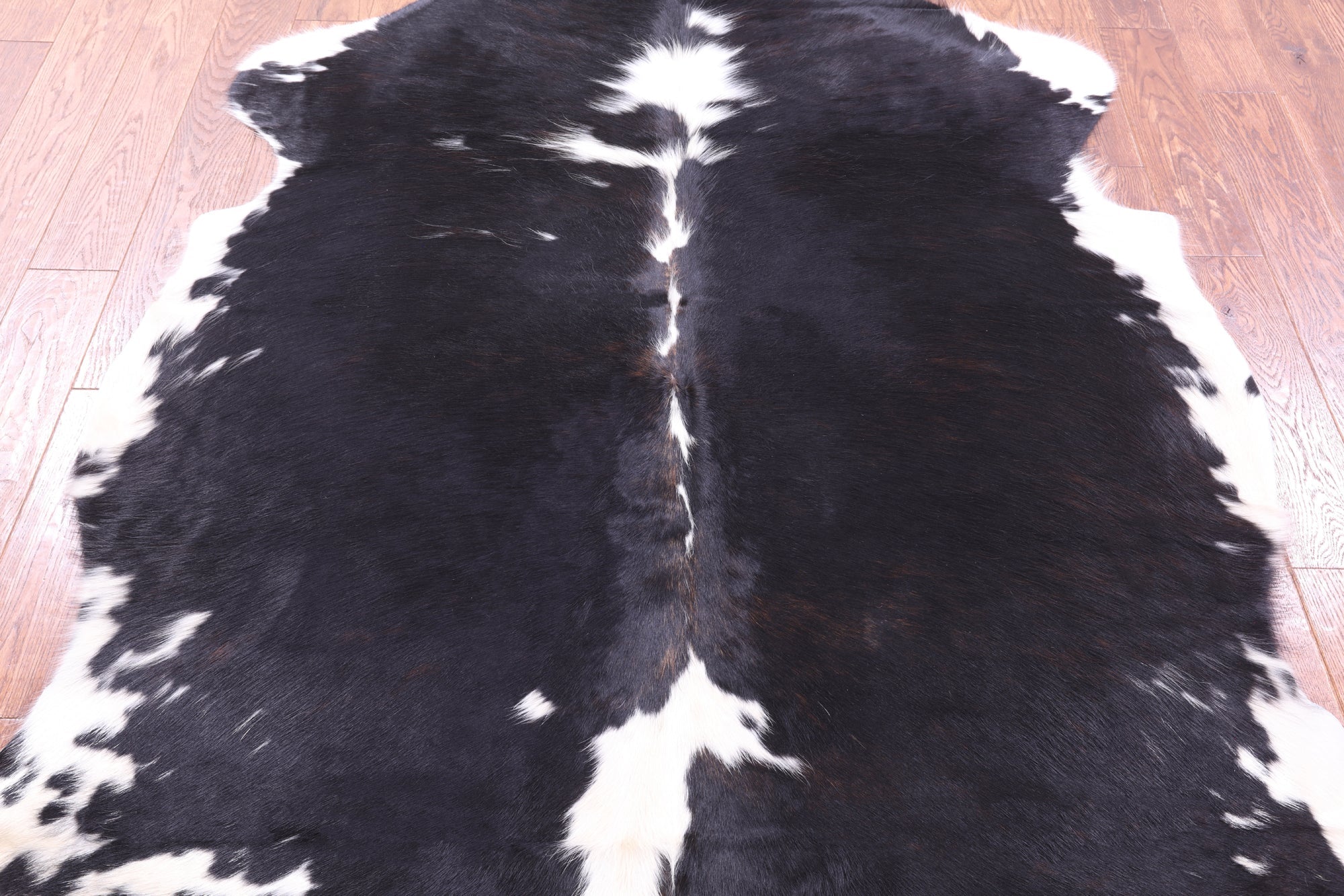Black & White Natural Hair-On Cowhide Rug - 6' 11" X 6' 0" - Golden Nile
