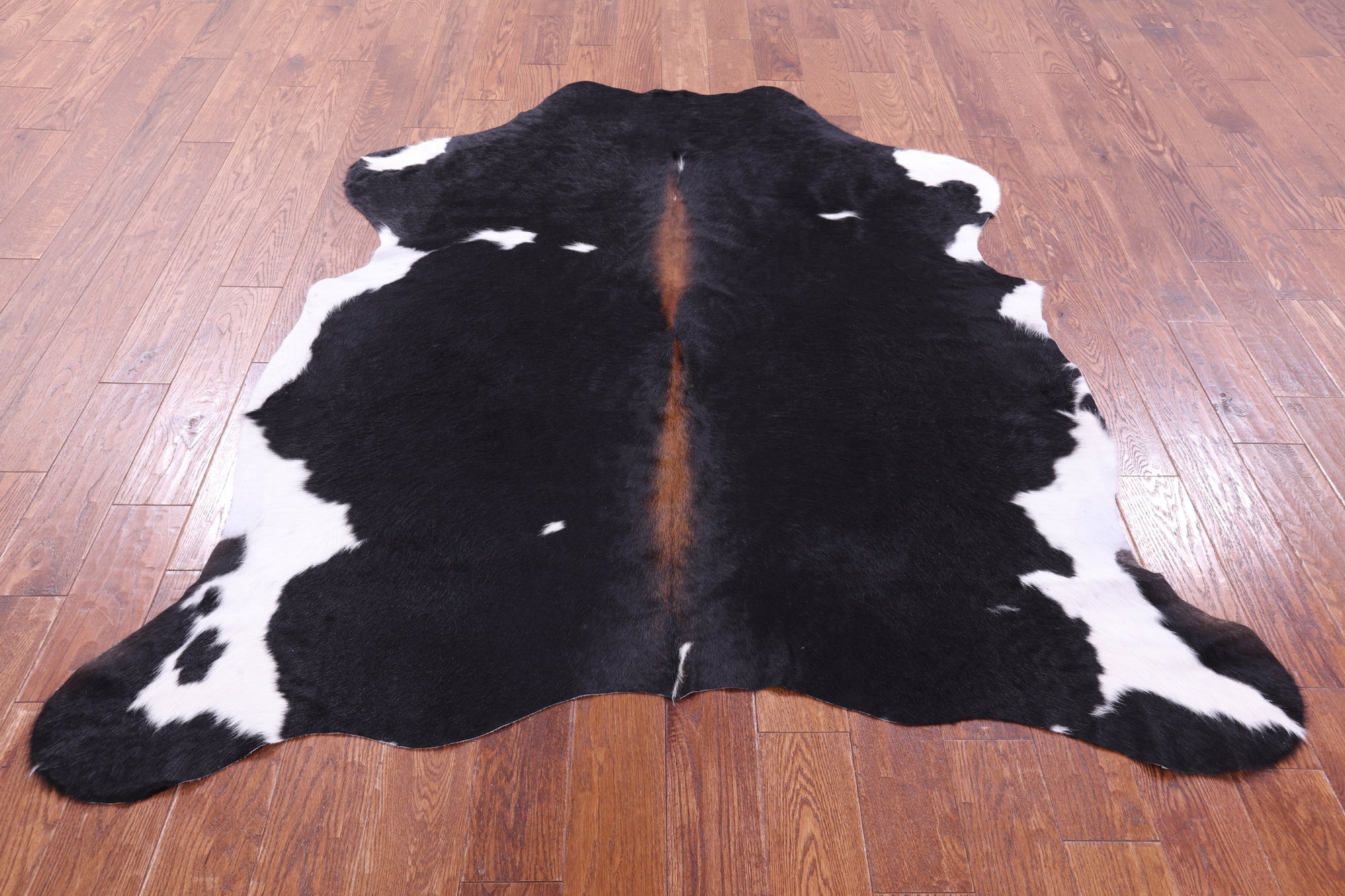 Black & White Natural Hair-On Cowhide Rug - 6' 5" X 5' 9" - Golden Nile