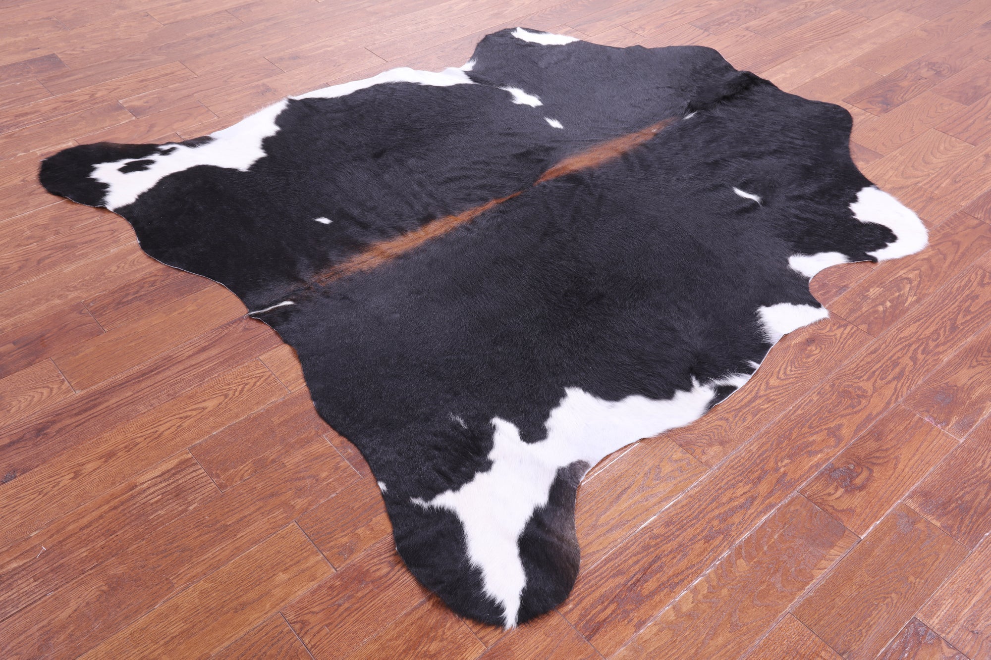 Black & White Natural Hair-On Cowhide Rug - 6' 5" X 5' 9" - Golden Nile