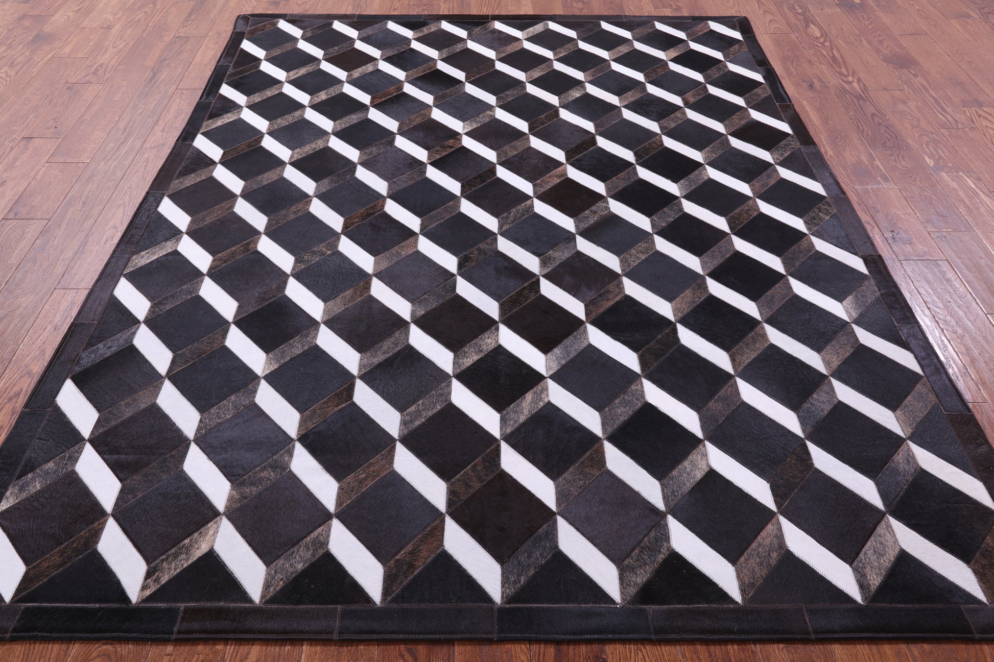 Black & White Natural Brown Cowhide Hand Stitched Patchwork Rug - 6' 8" X 8' 4" - Golden Nile