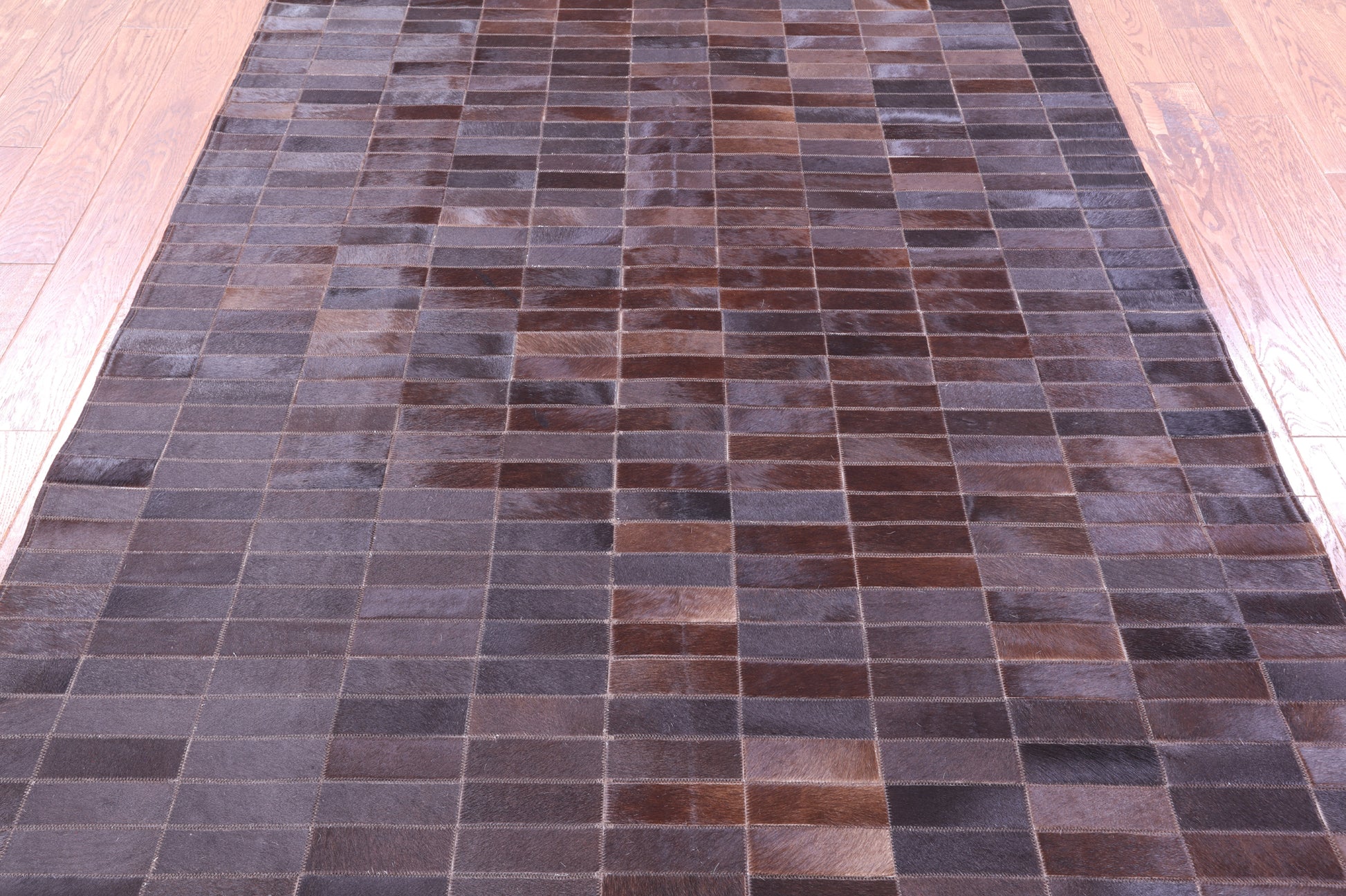 Brown Brickwork Natural Cowhide Hand Stitched Patchwork Rug - 5' 4" X 6' 7" - Golden Nile