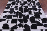 Black & White Natural Cowhide Hand Stitched Patchwork Rug - 5' 3" X 6' 7" - Golden Nile