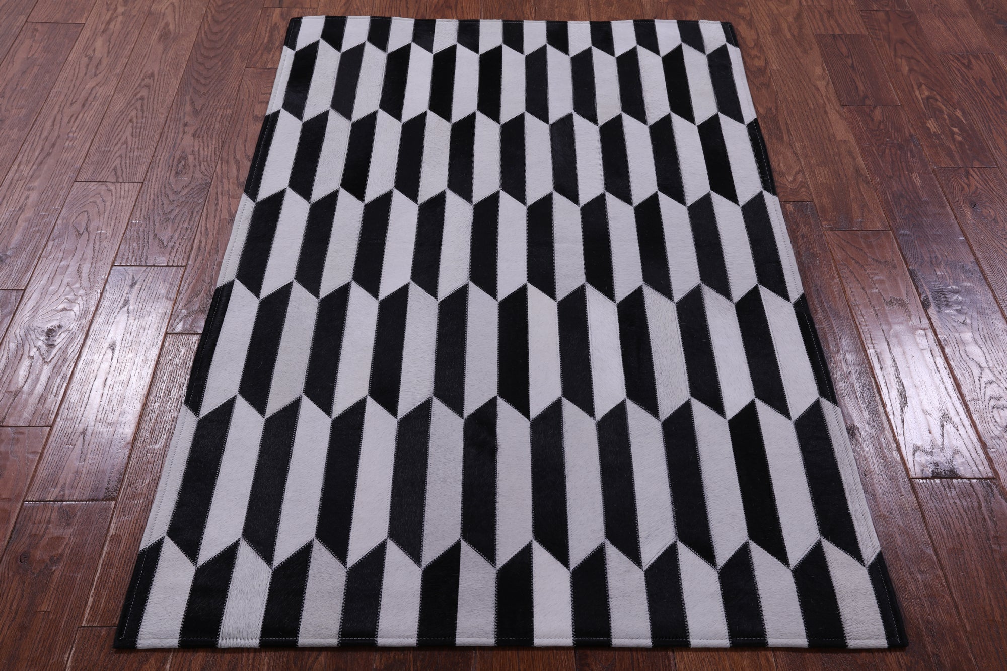 Black & White Natural Cowhide Hand Stitched Patchwork Rug - 3' 4" X 5' 0" - Golden Nile