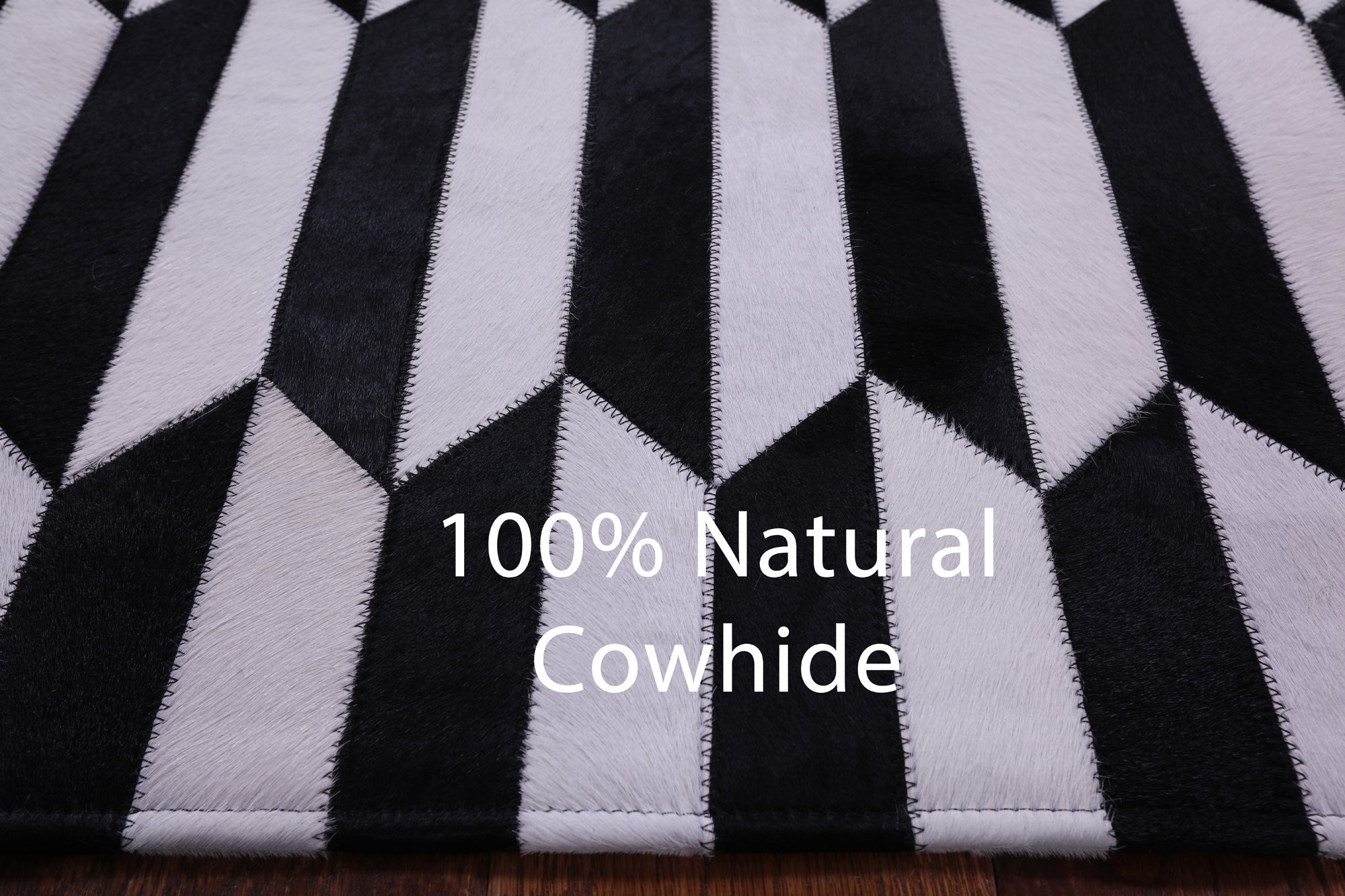 Black & White Natural Cowhide Hand Stitched Patchwork Rug - 3' 3" X 5' 0" - Golden Nile