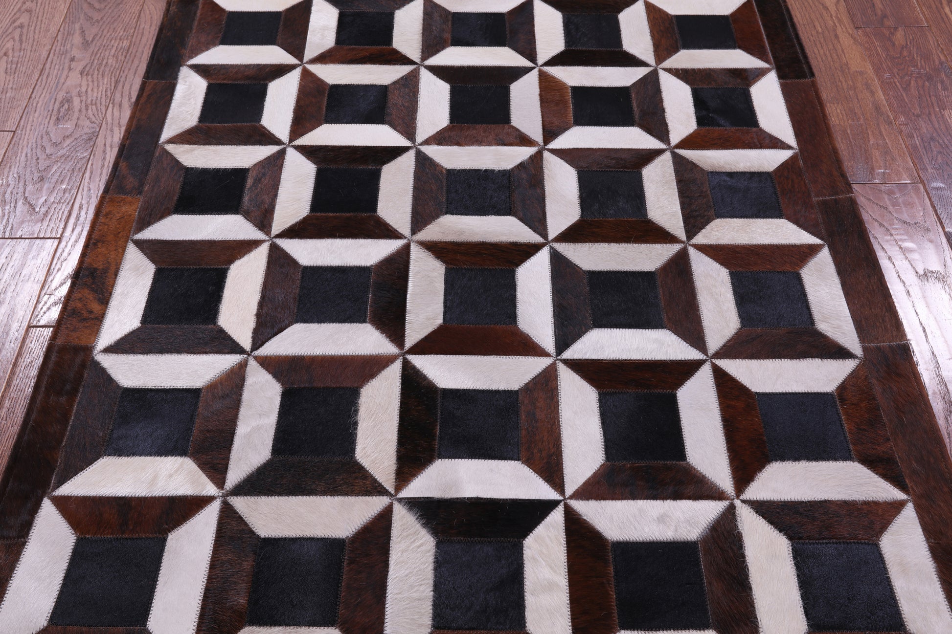 Brown & White Natural Black Cowhide Hand Stitched Patchwork Rug - 3' 8" X 5' 0" - Golden Nile
