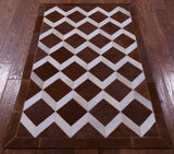Brown & White Natural Cowhide Hand Stitched Patchwork Rug - 3' 2" X 5' 0"