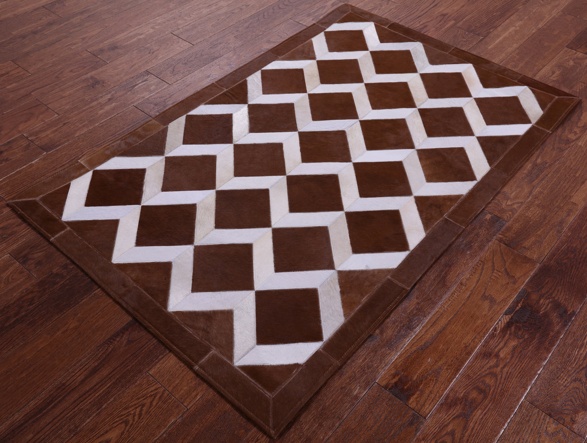 Brown & White Natural Cowhide Hand Stitched Patchwork Rug - 3' 2" X 5' 0" - Golden Nile