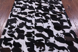 Black & White Natural Cowhide Hand Stitched Patchwork Rug - 5' 0" X 6' 7"
