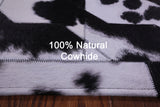 Black & White Natural Cowhide Hand Stitched Patchwork Rug - 5' 0" X 6' 7"