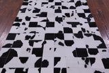 Black & White Natural Cowhide Hand Stitched Patchwork Rug - 4' 10" X 6' 9"