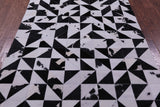 Black & White Natural Cowhide Hand Stitched Patchwork Rug - 4' 11" X 6' 10"