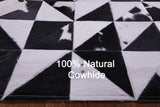 Black & White Natural Cowhide Hand Stitched Patchwork Rug - 4' 11" X 6' 10"