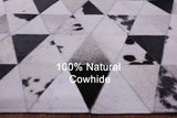 Black & White Natural Cowhide Hand Stitched Patchwork Rug - 5' 0" X 6' 5"