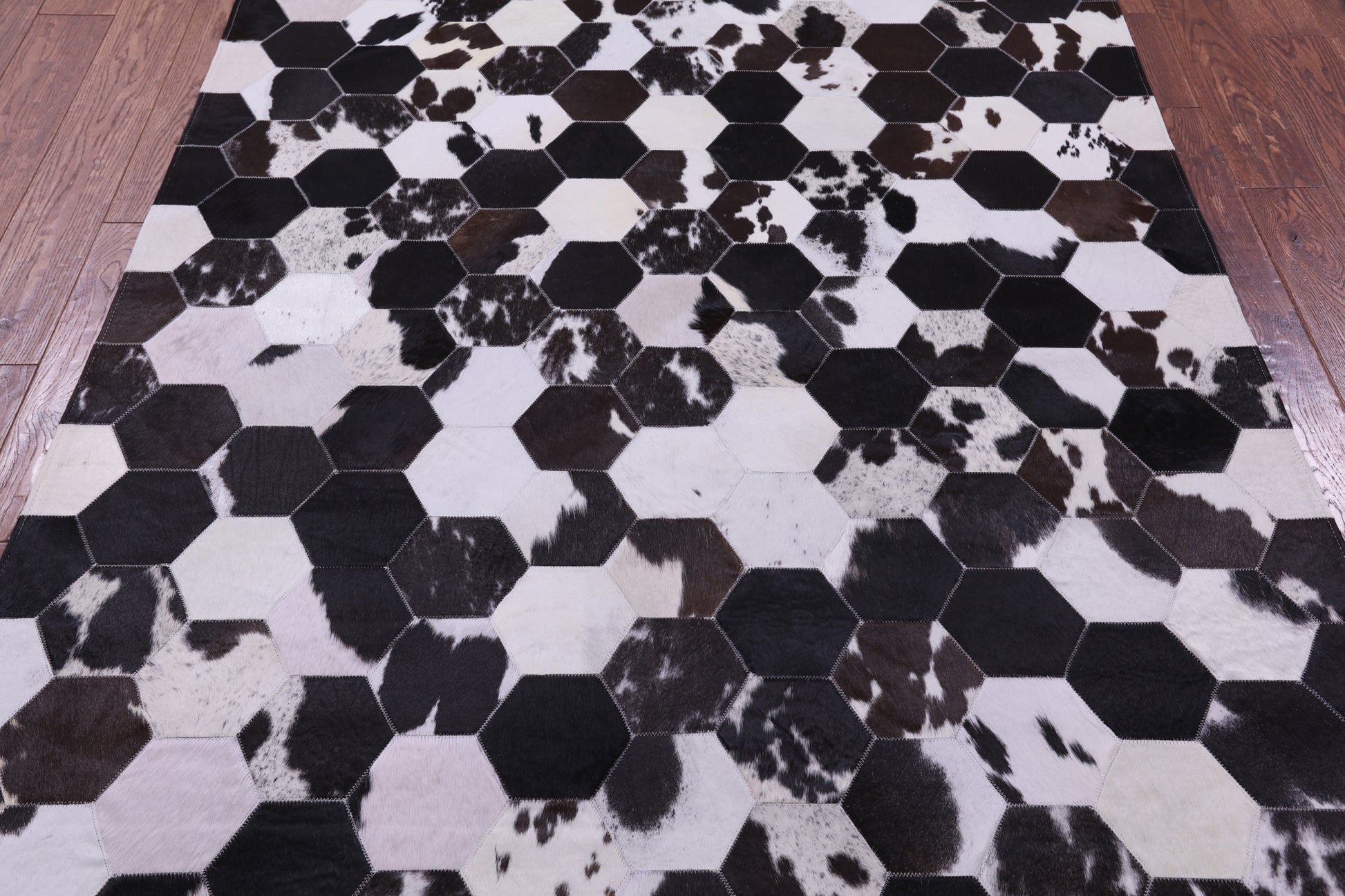 Black & White With Pink Hue Natural Cowhide Hand Stitched Patchwork Rug - 5' 0" X 6' 8" - Golden Nile