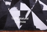 Black & White Natural Cowhide Hand Stitched Patchwork Rug - 4' 11" X 6' 5" - Golden Nile