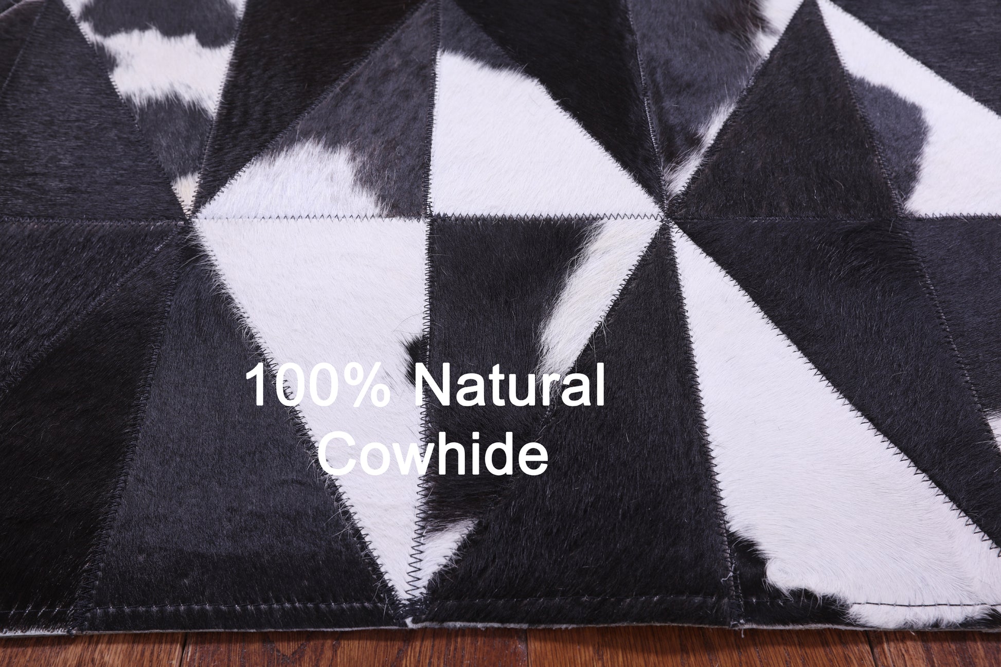 Black & White Natural Cowhide Hand Stitched Patchwork Rug - 4' 11" X 6' 5" - Golden Nile