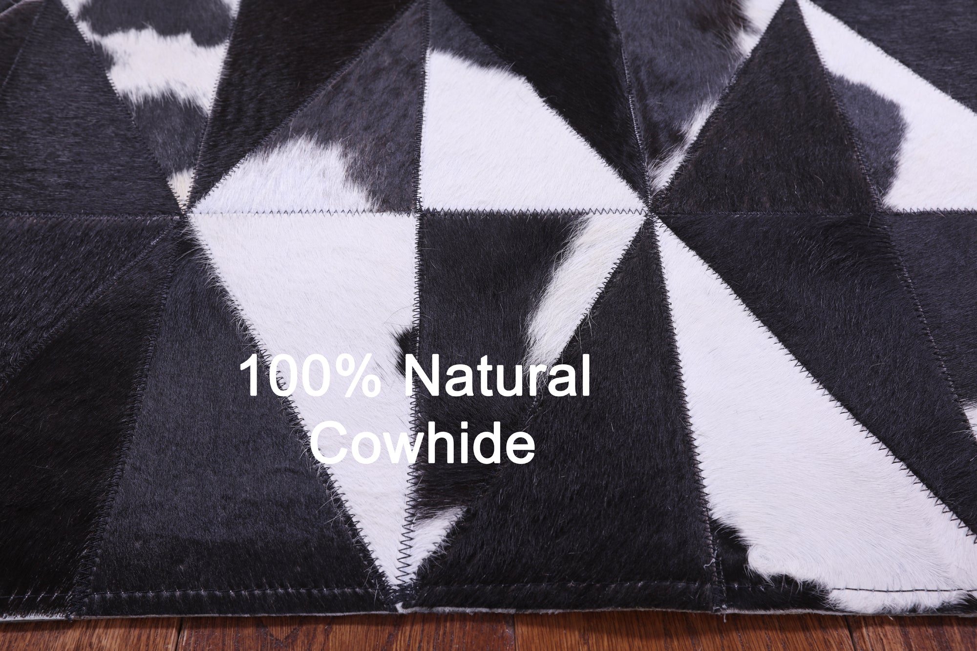 Black & White Natural Cowhide Hand Stitched Patchwork Rug - 4' 11" X 6' 5" - Golden Nile