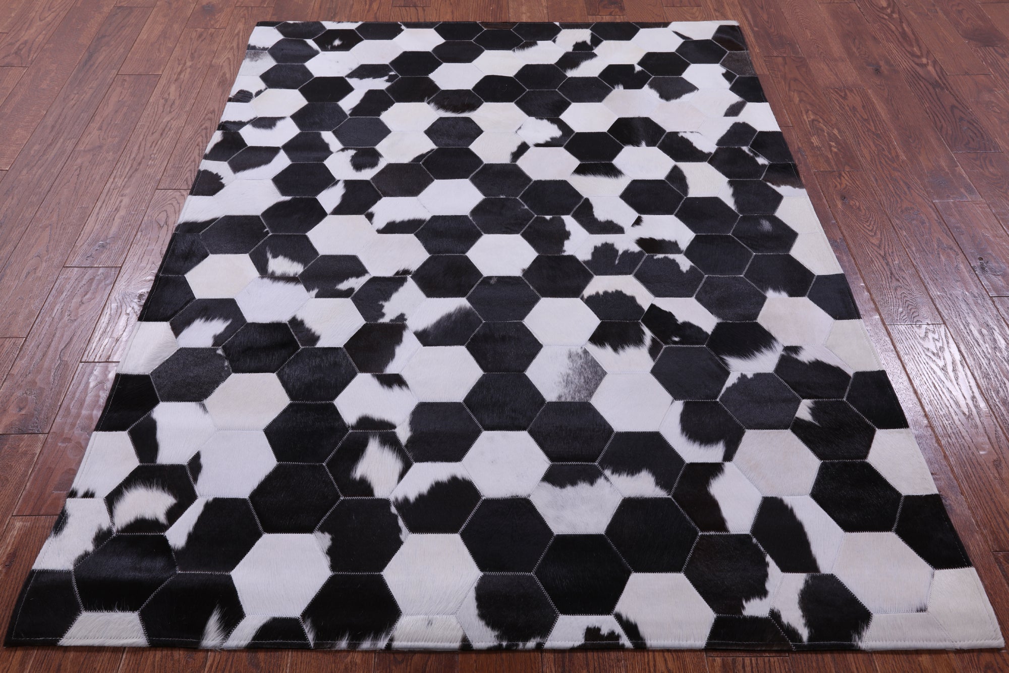 Black & White Natural Cowhide Hand Stitched Patchwork Rug - 5' 0" X 6' 7" - Golden Nile