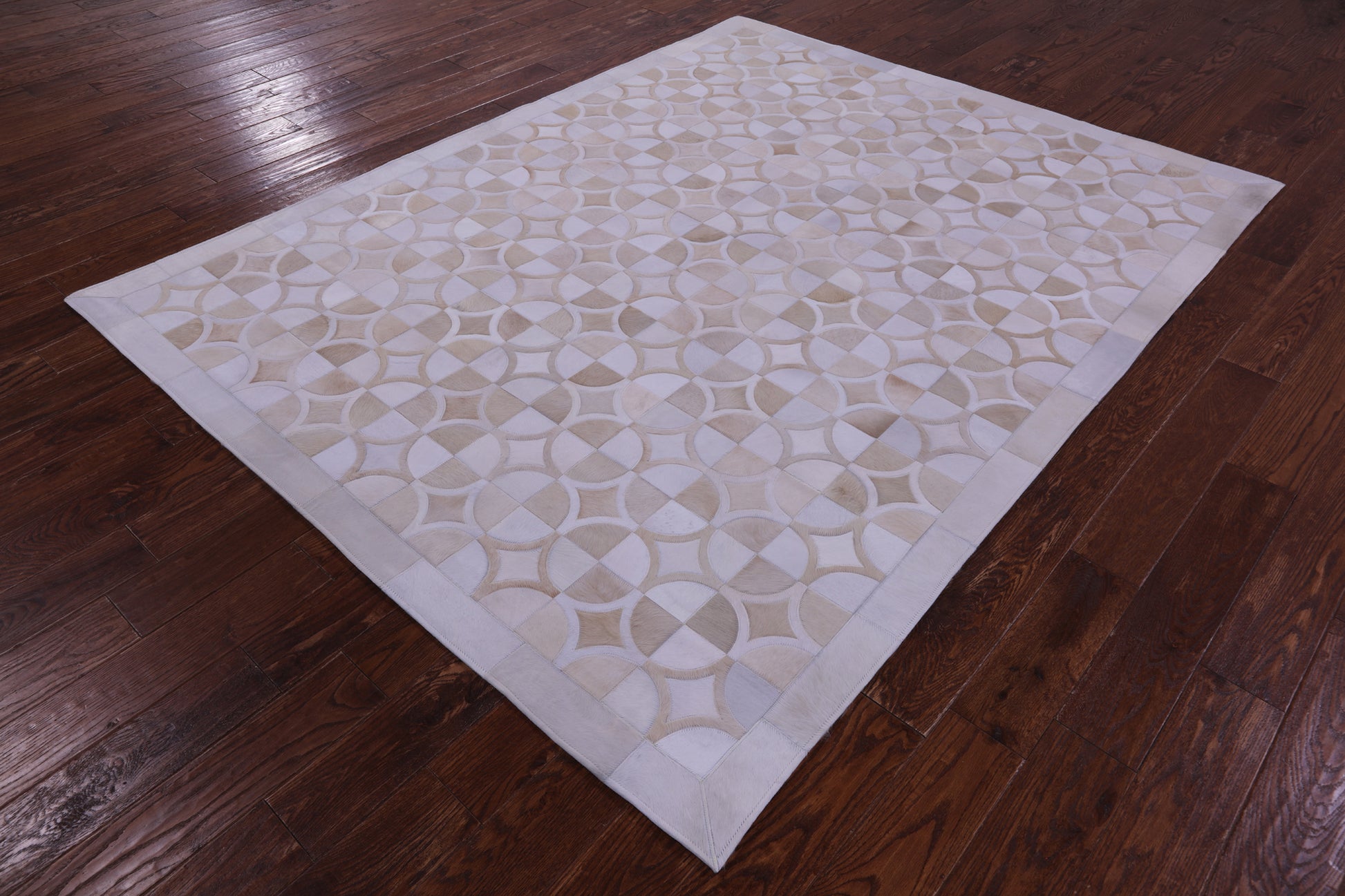 Brown & White Natural Cowhide Hand Stitched Patchwork Rug - 6' 4" X 8' 3" - Golden Nile