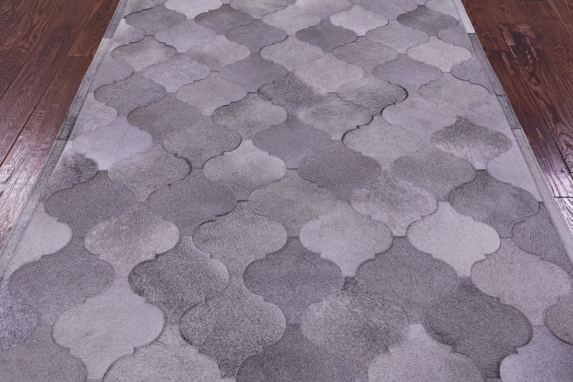 Lantern Tile Grey Natural Cowhide Hand Stitched Patchwork Rug - 4' 10" X 6' 7" - Golden Nile