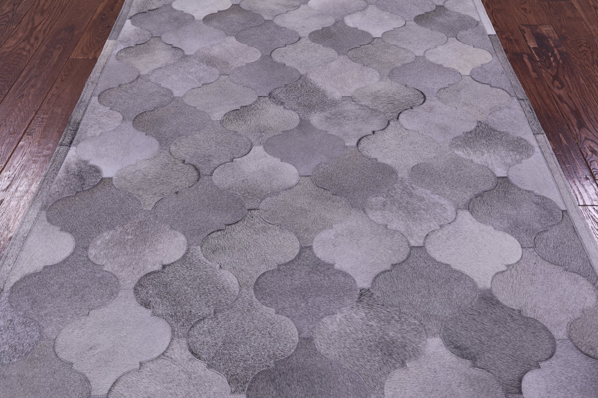 Lantern Tile Grey Natural Cowhide Hand Stitched Patchwork Rug - 4' 10" X 6' 7" - Golden Nile