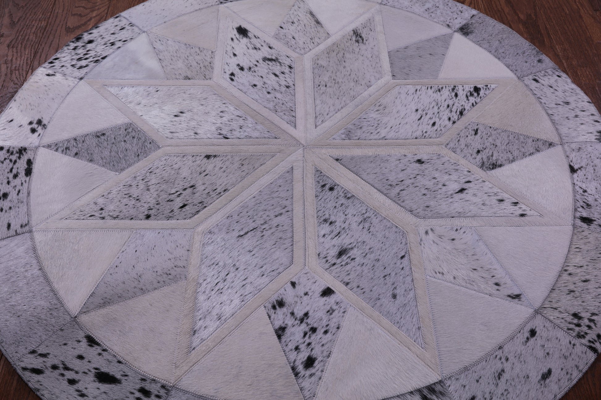 Black Salt & Pepper Round Star Natural Cowhide Hand Stitched Patchwork Rug - 4' 0" X 4' 0" - Golden Nile