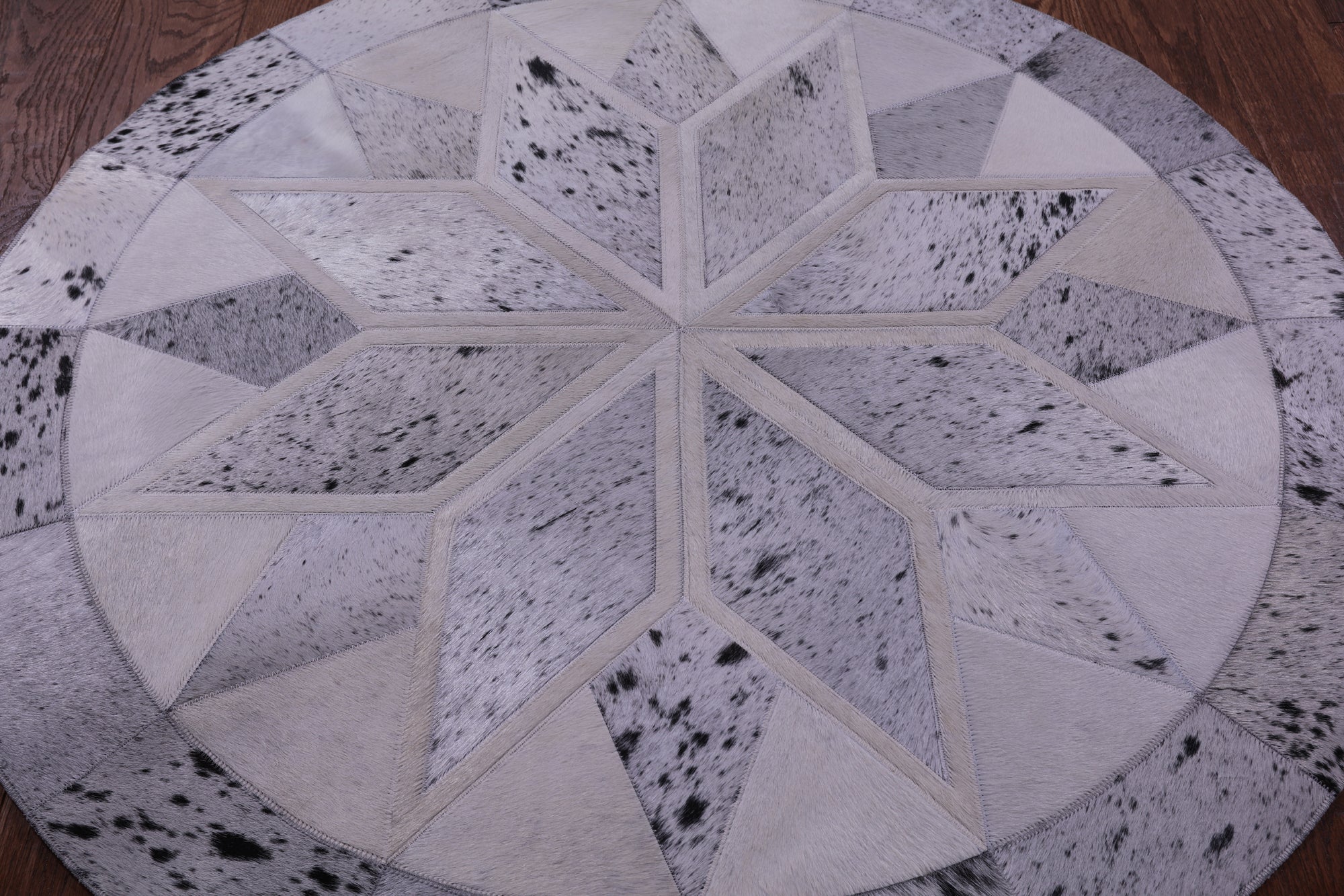 Black Salt & Pepper Round Star Natural Cowhide Hand Stitched Patchwork Rug - 4' 0" X 4' 0" - Golden Nile