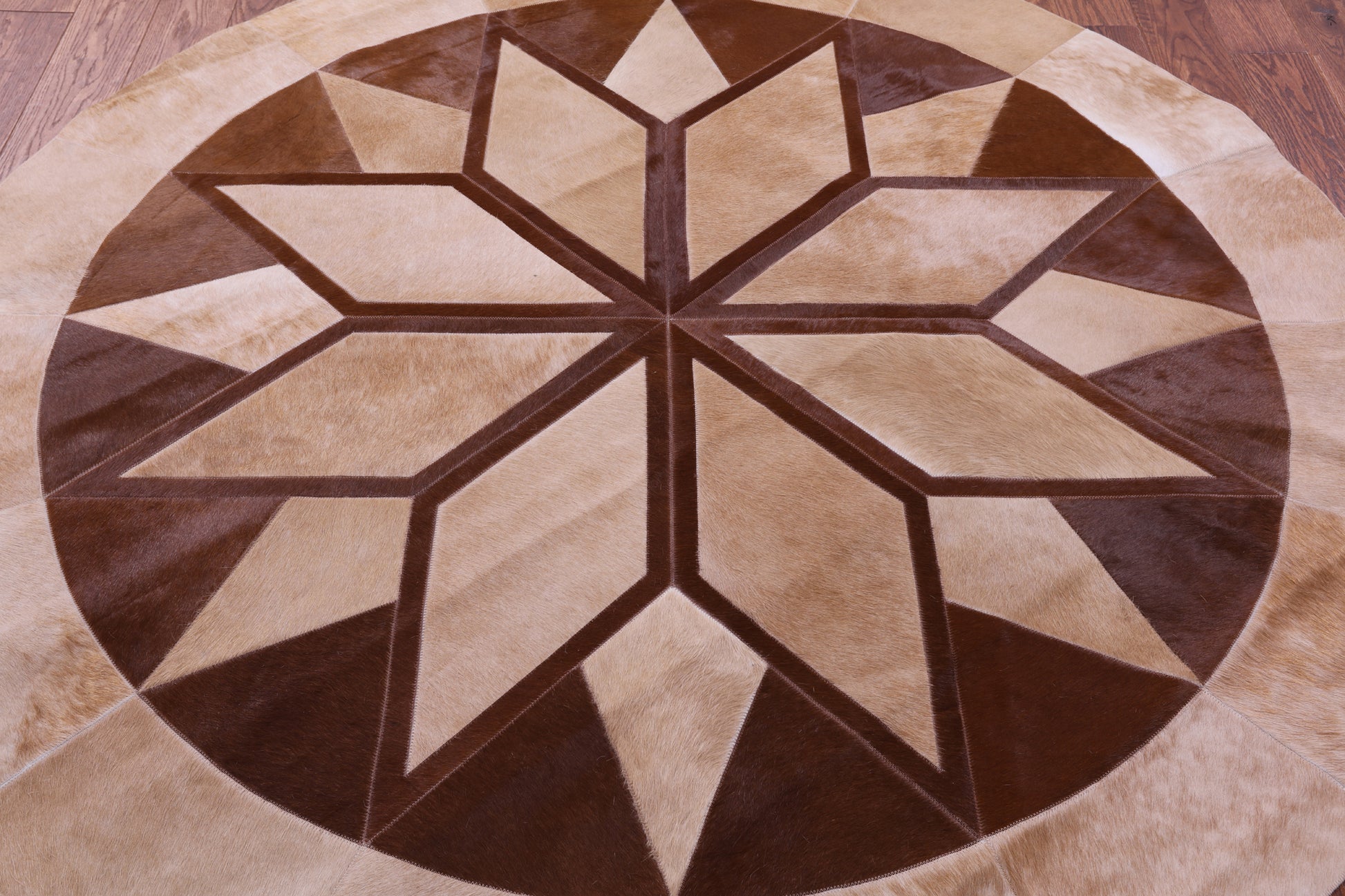 Brown Round Star Natural Cowhide Hand Stitched Patchwork Rug - 6' 6" X 6' 6" - Golden Nile