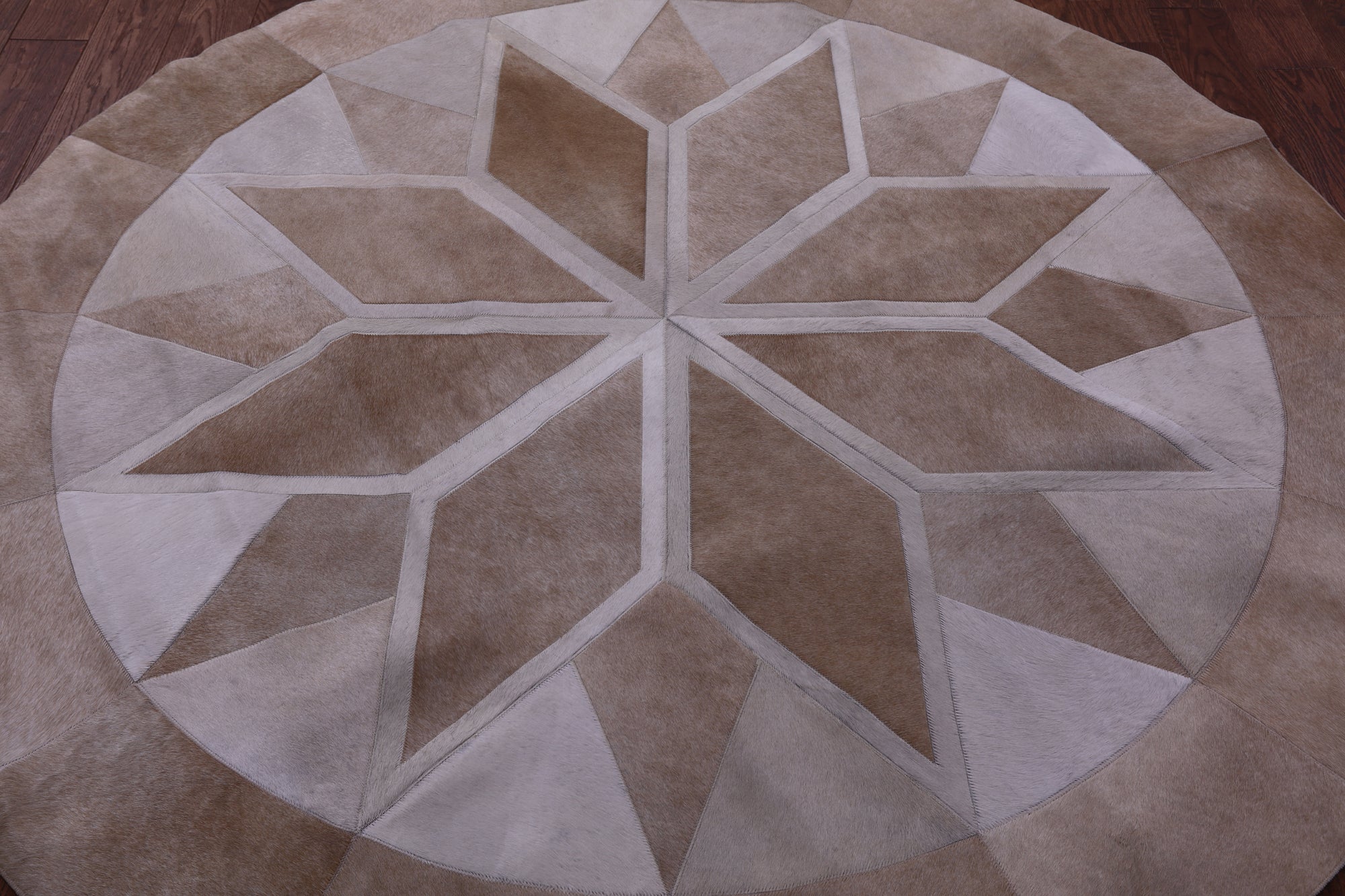 Brown Round Star Natural Cowhide Hand Stitched Patchwork Rug - 6' 6" X 6' 6" - Golden Nile