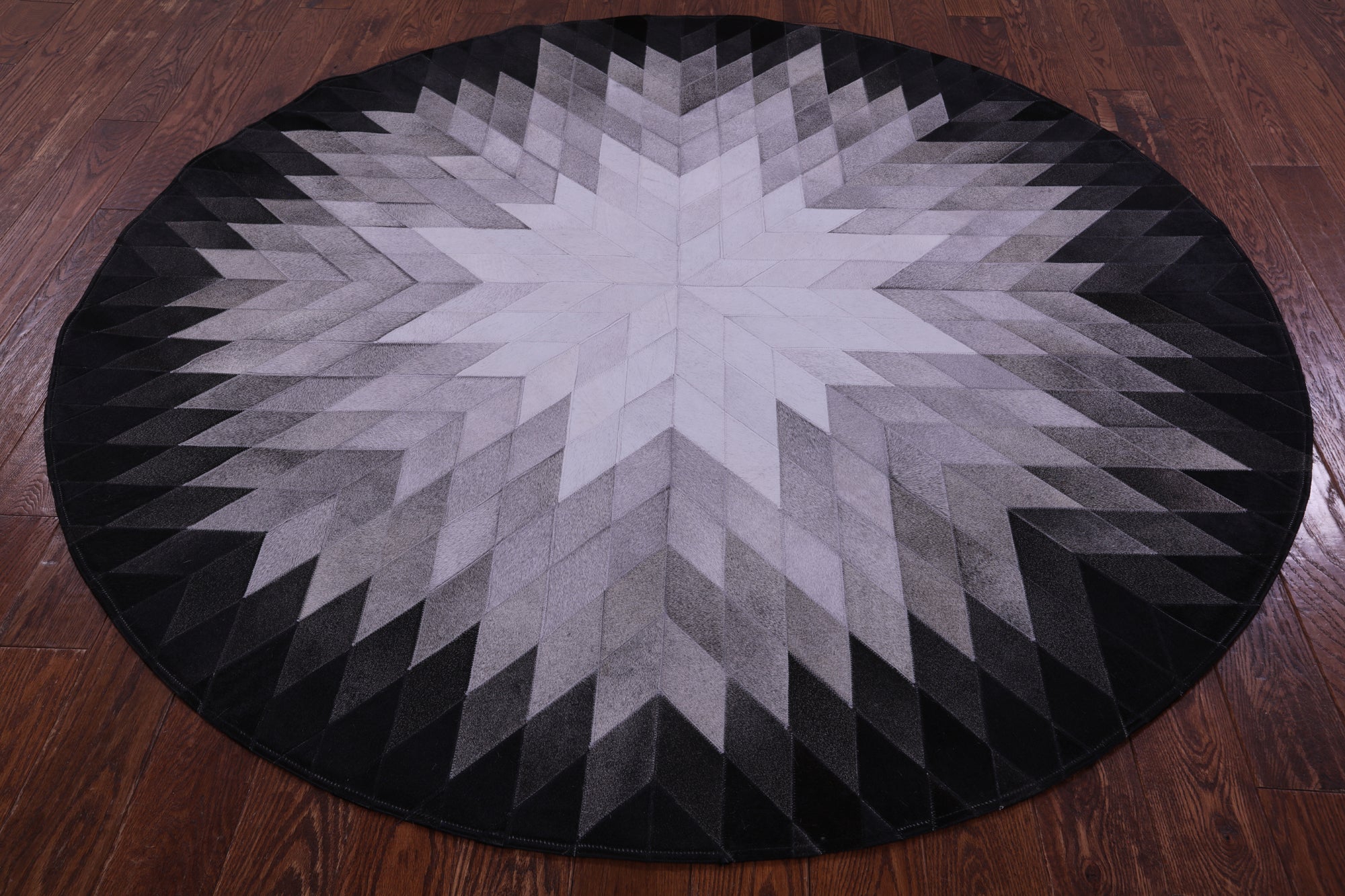 Black & White Round Star Natural Cowhide Hand Stitched Patchwork Rug - 6' 7" X 6' 7" - Golden Nile