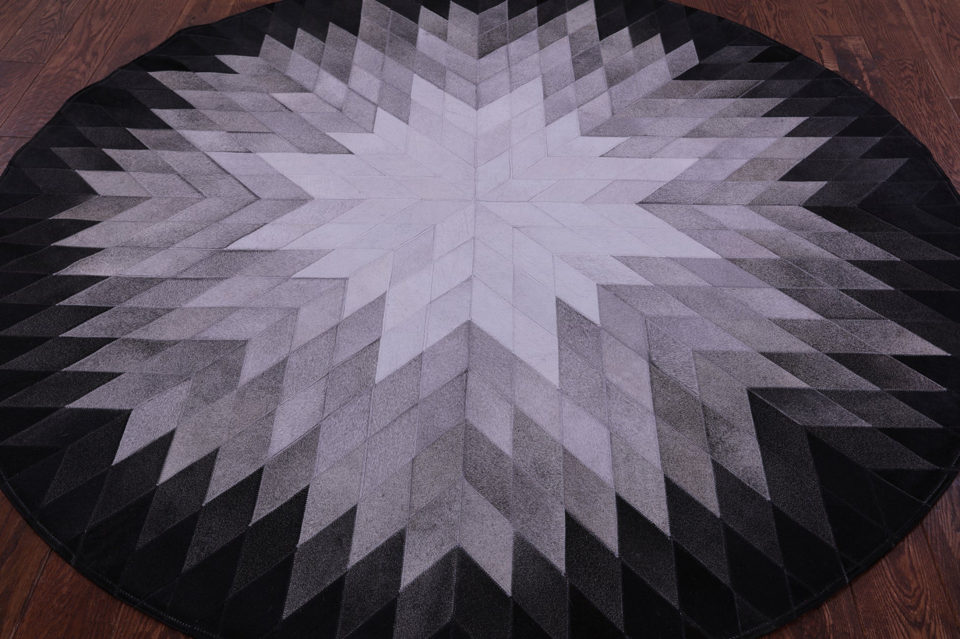 Black & White Round Star Natural Cowhide Hand Stitched Patchwork Rug - 6' 7" X 6' 7" - Golden Nile