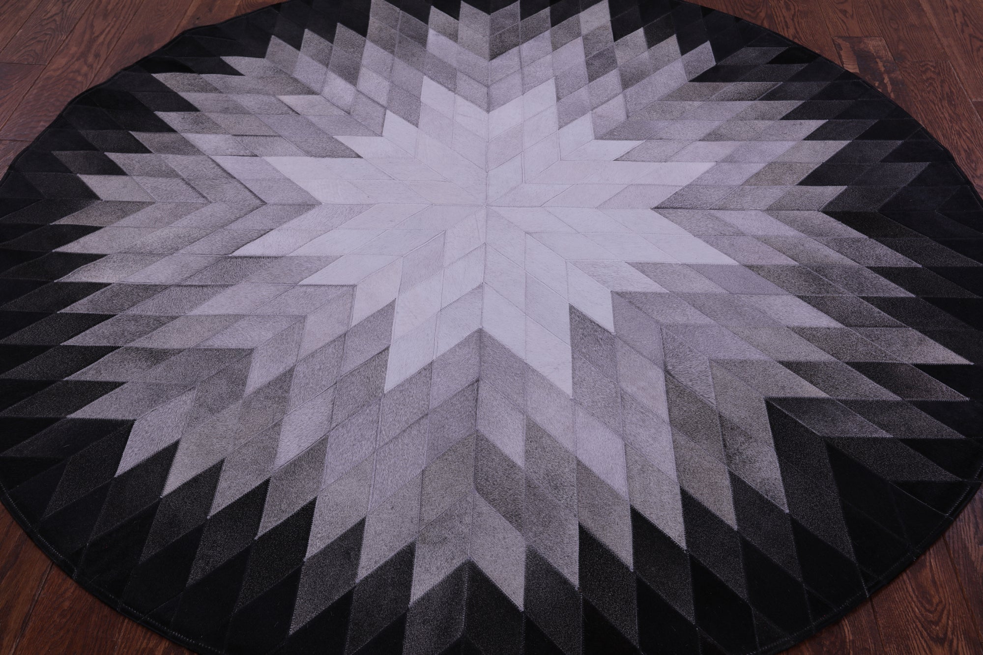Black & White Round Star Natural Cowhide Hand Stitched Patchwork Rug - 6' 7" X 6' 7" - Golden Nile