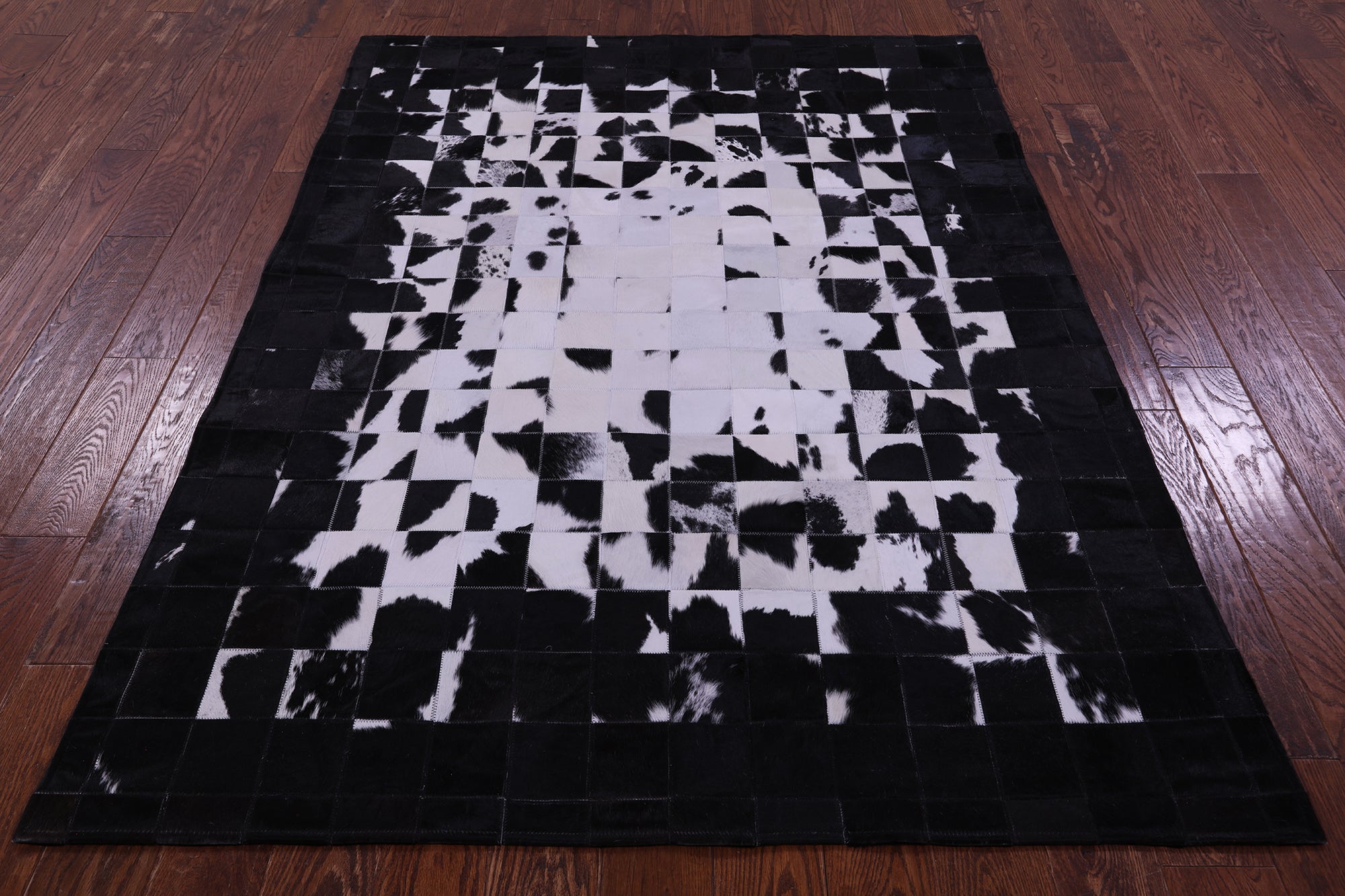 Black & White Natural Cowhide Hand Stitched Patchwork Rug - 6' 0" X 7' 5"