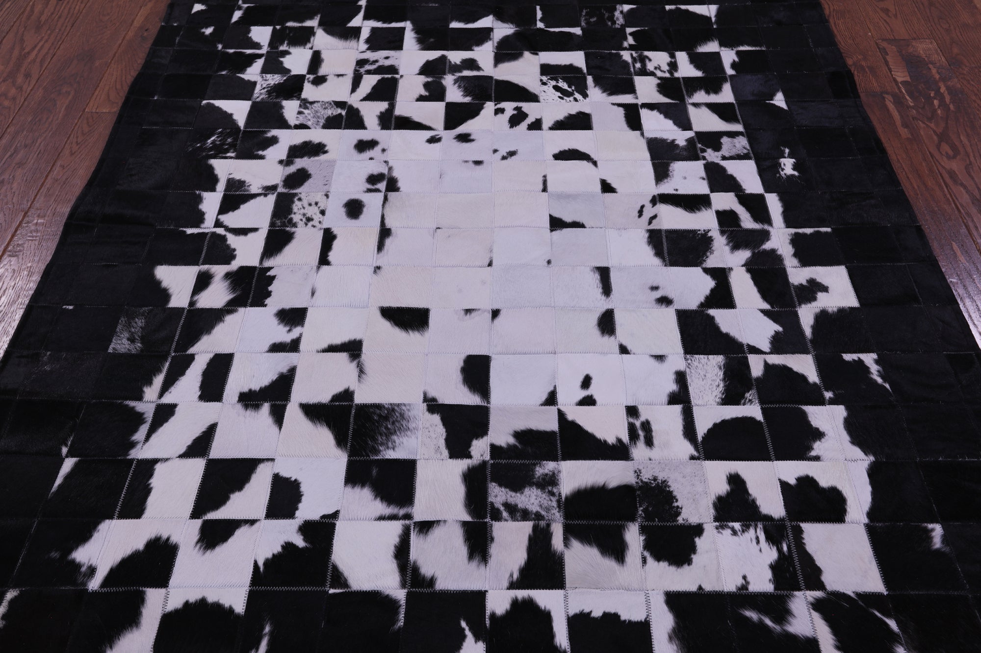 Black & White Natural Cowhide Hand Stitched Patchwork Rug - 6' 0" X 7' 5"