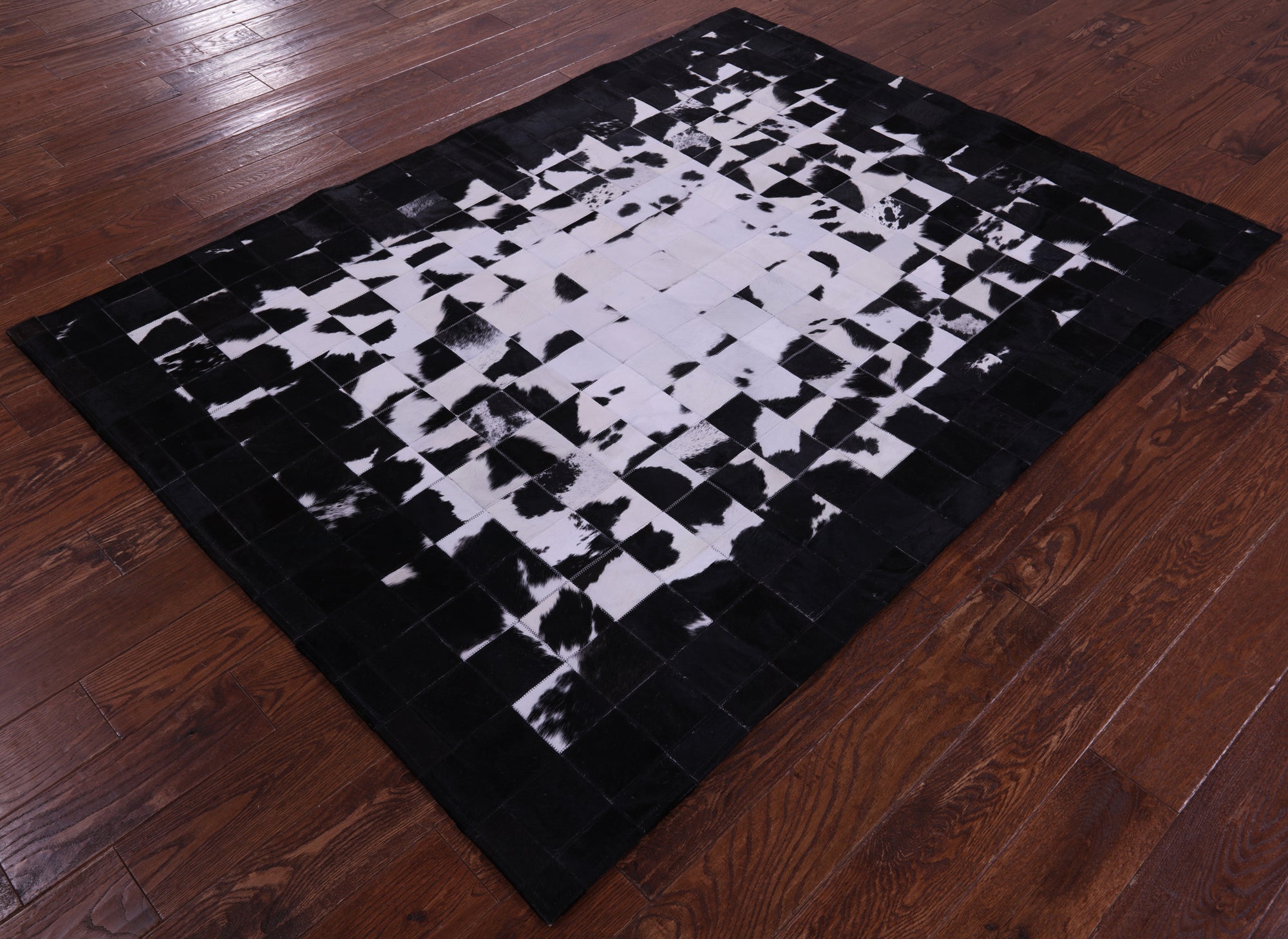 Black & White Natural Cowhide Hand Stitched Patchwork Rug - 6' 0" X 7' 5"