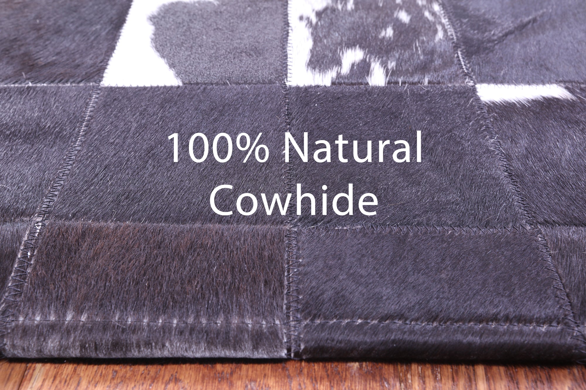 Black & White Natural Cowhide Hand Stitched Patchwork Rug - 6' 0" X 7' 5"