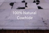 Black & White Natural Cowhide Hand Stitched Patchwork Rug - 5' 0" X 6' 7"