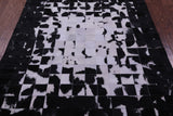 Black & White Natural Cowhide Hand Stitched Patchwork Rug - 5' 0" X 6' 7"