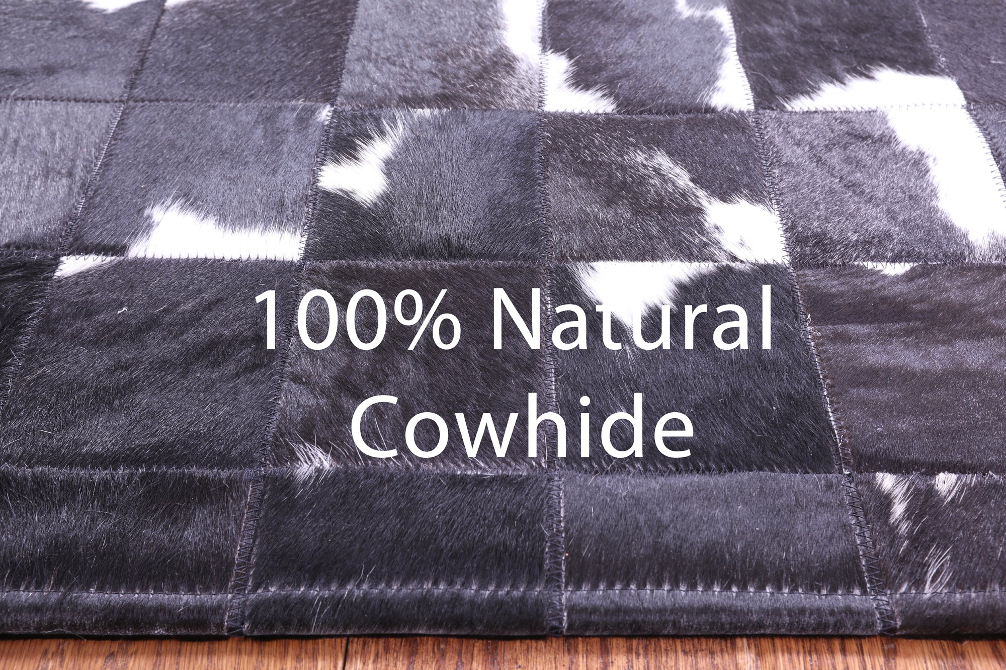 Black & White Natural Cowhide Hand Stitched Patchwork Rug - 5' 0" X 6' 7"