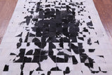 Black & White Natural Cowhide Hand Stitched Patchwork Rug - 5' 0" X 6' 7"