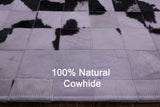 Black & White Natural Cowhide Hand Stitched Patchwork Rug - 5' 0" X 6' 7"