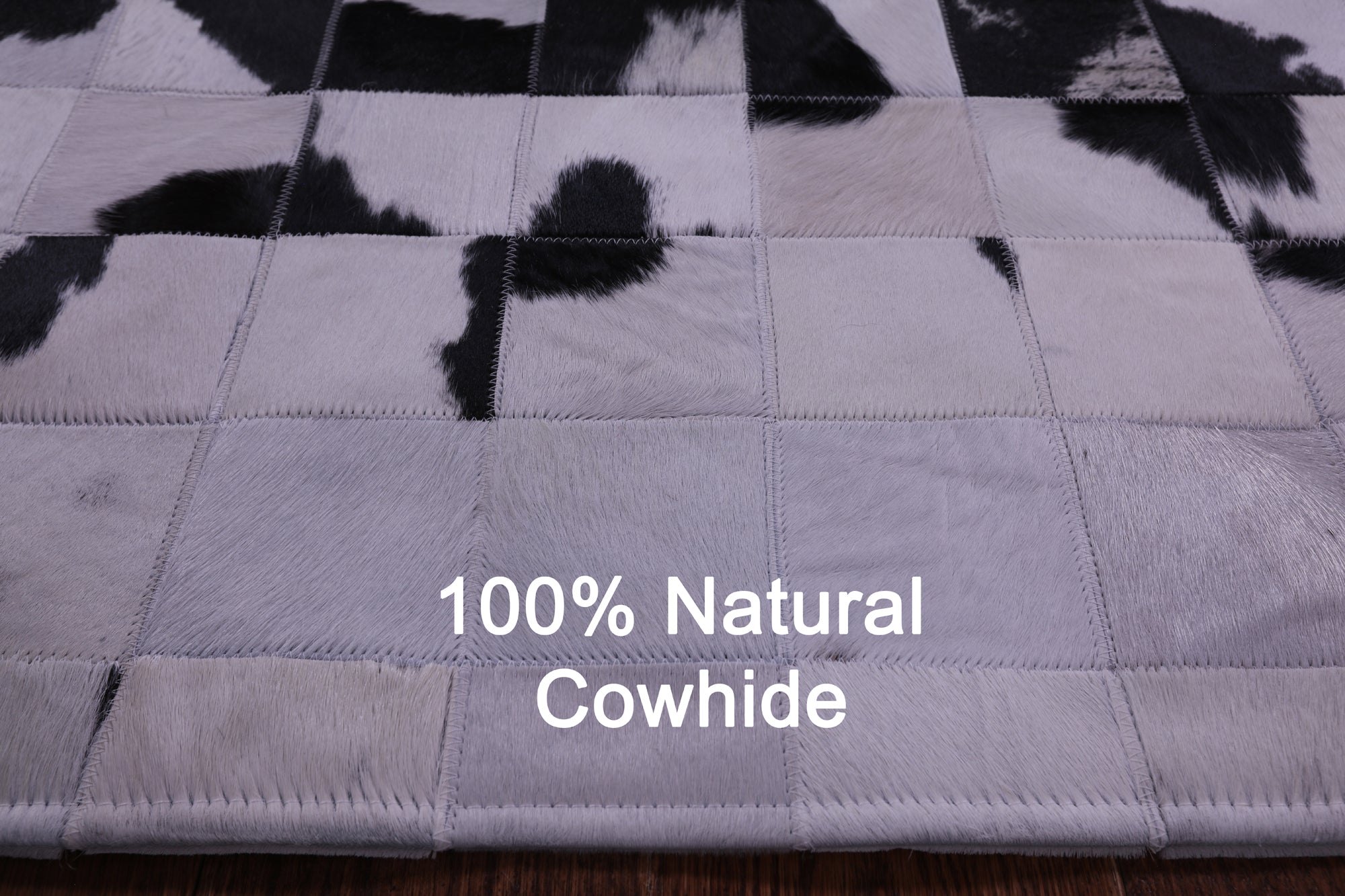 Black & White Natural Cowhide Hand Stitched Patchwork Rug - 5' 0" X 6' 7"