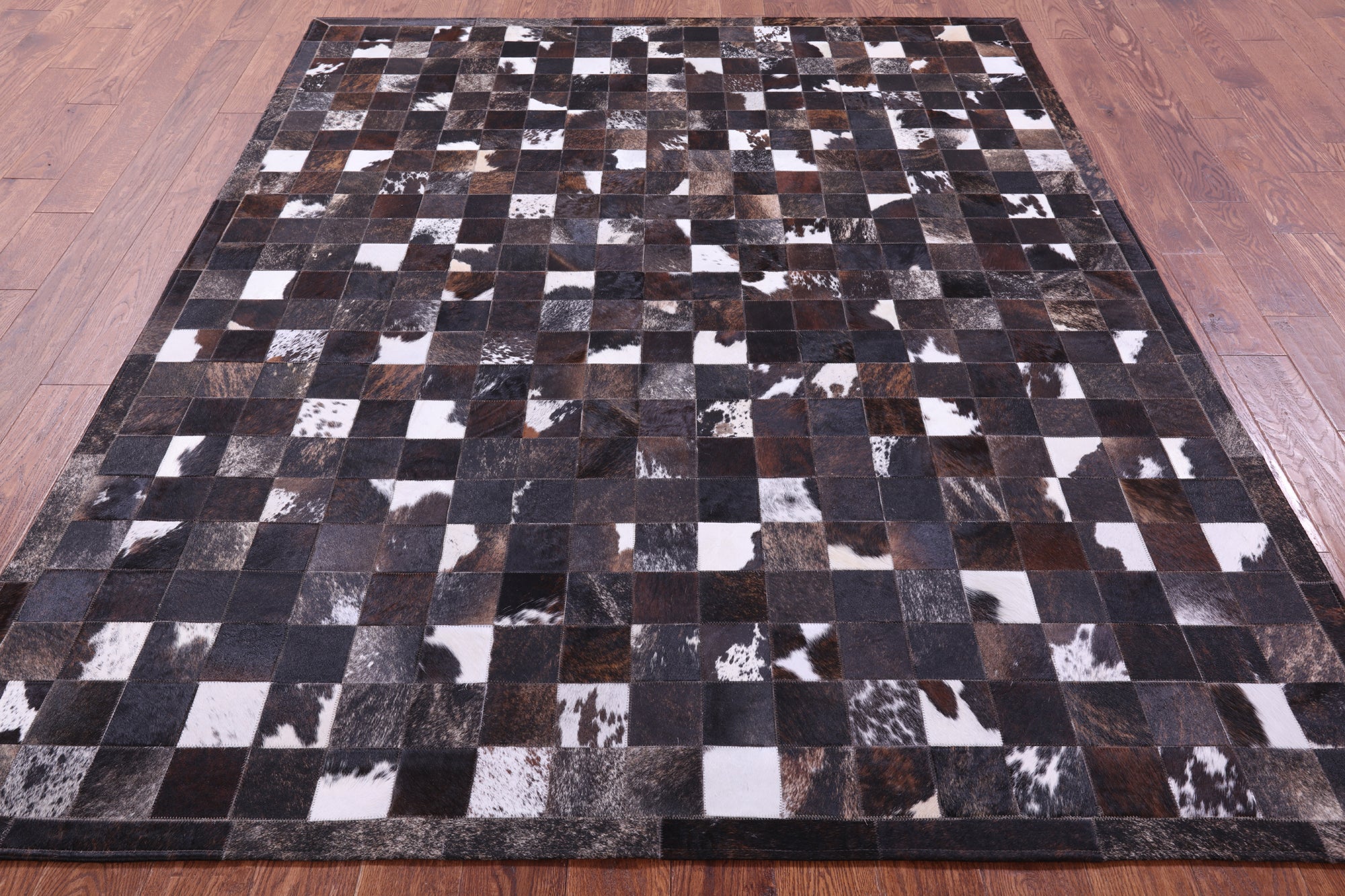 Brown & White Brindle Natural Cowhide Hand Stitched Patchwork Rug - 6' 7" X 8' 3"