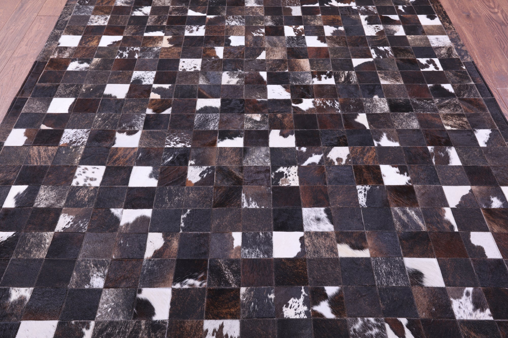 Brown & White Brindle Natural Cowhide Hand Stitched Patchwork Rug - 6' 7" X 8' 3"
