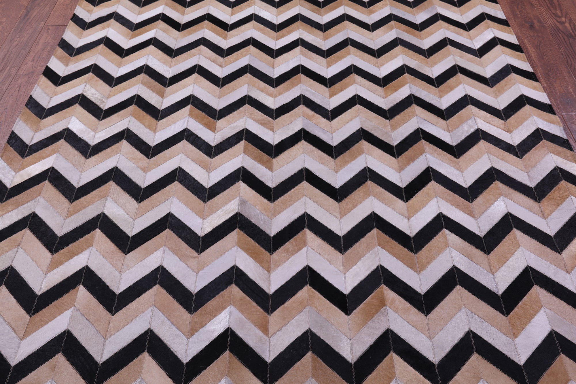 Brown & Beige Chevron Black Natural Cowhide Hand Stitched Patchwork Rug - 6' 8" X 8' 4"