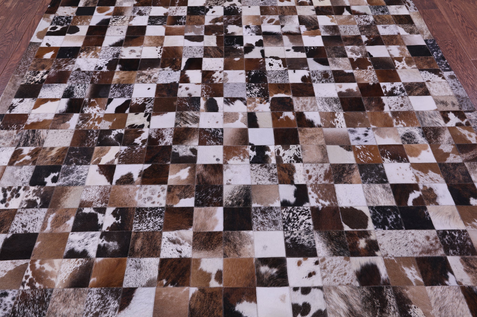 Brown & White Brindle Natural Cowhide Hand Stitched Patchwork Rug - 6' 7" X 8' 3"
