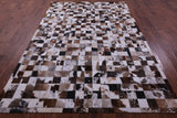 Brown & White Natural Cowhide Hand Stitched Patchwork Rug - 6' 7" X 9' 10"