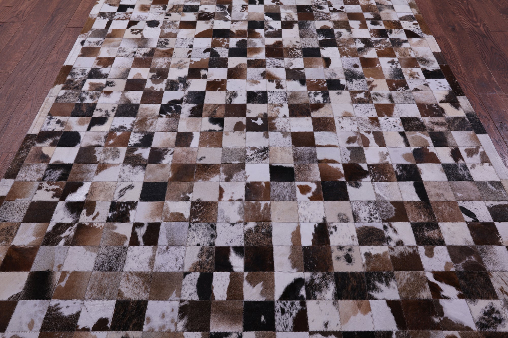 Brown & White Natural Cowhide Hand Stitched Patchwork Rug - 6' 7" X 9' 10"