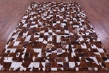 Brown & White Natural Cowhide Hand Stitched Patchwork Rug - 6' 7" X 9' 10"